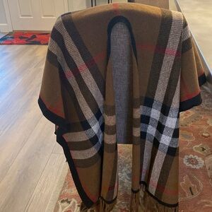 Brand new never worn one size fits all shawl reversible very warm soft fabric